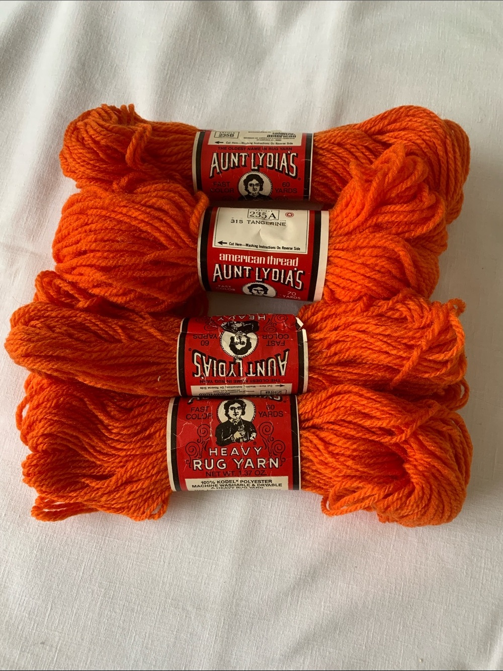 Aunt Lydia’s Rug Yarn - 4 Skeins - 60 yards x 2 and 70 yards x 2 "Tangerine"